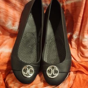 Black and Silver Crocs Loafers with Decorative Medallion Size 10